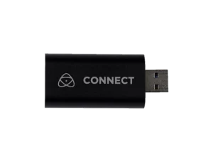 Vue frontale de la clé de streaming ATOMOS CONNECT 4K avec le logo 'CONNECT' visible sur le corps noir de l'appareil et le connecteur USB à une extrémité